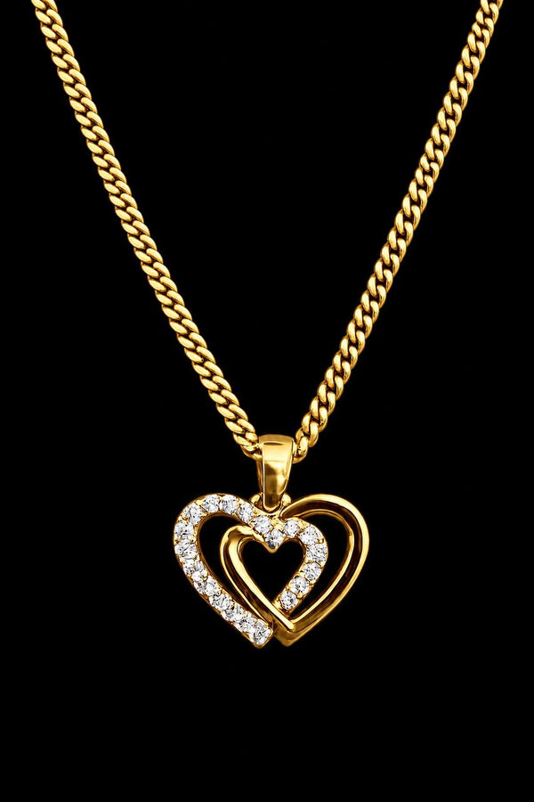 10K Yellow Gold Double Heart CZ Pendant Close-Up on Cuban Link Chain – True Smith Jewelers